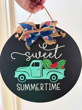 Source Unknown Black Sign with Aqua Truck and Watermelon Accents